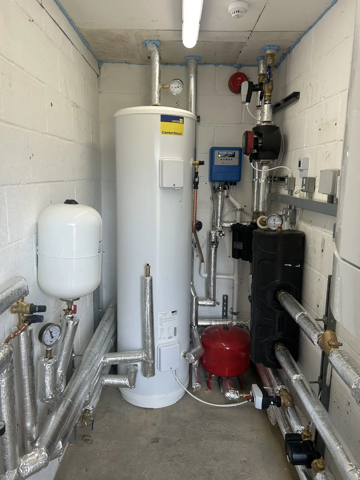 Unvented cylinder and plant room installation